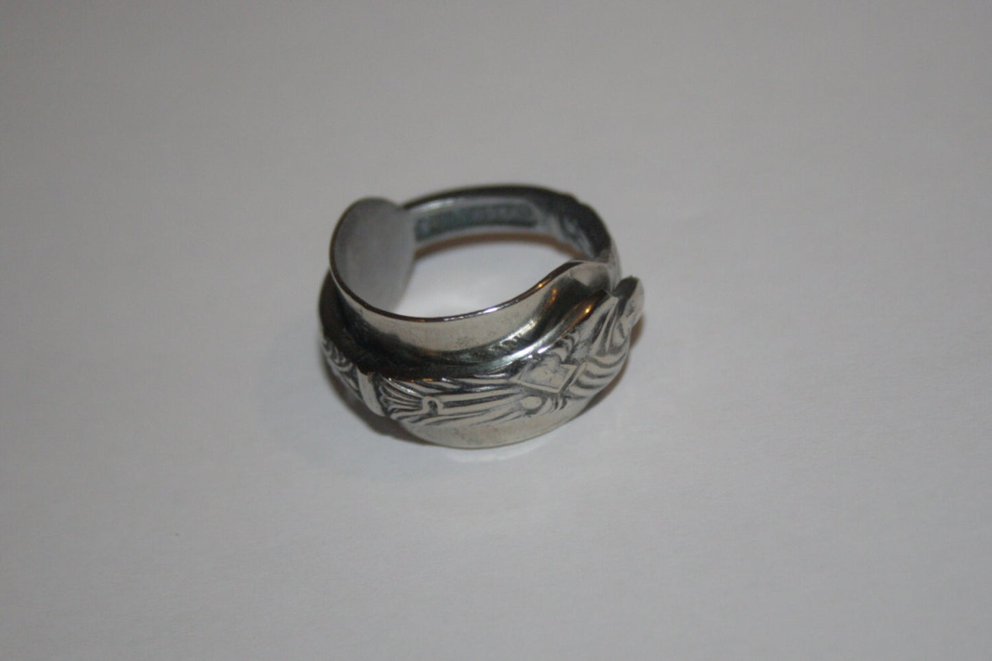 Upcycled silver ring made from antique apostle spoon with detailed apostle figure