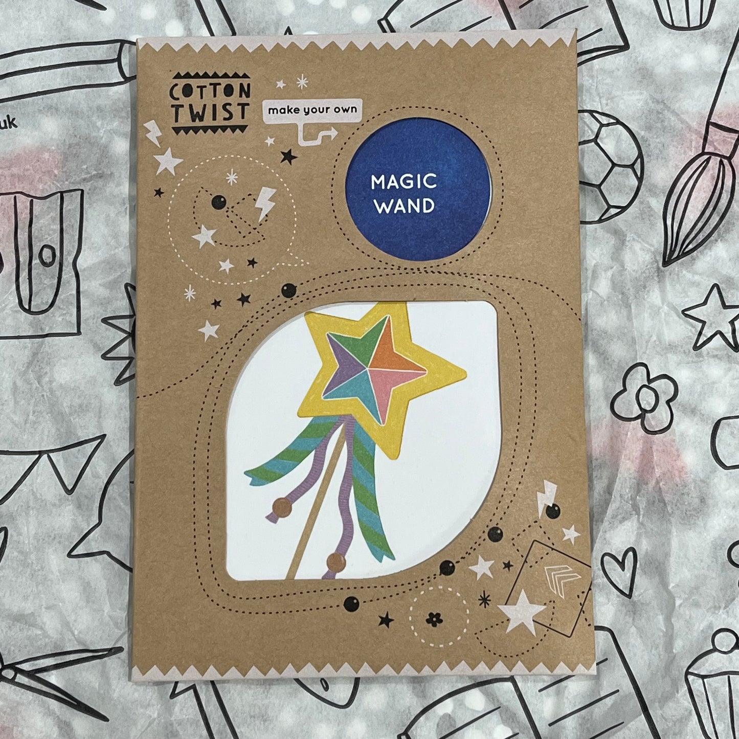 Plastic-free kids space monster puppet kit with wooden cutouts, beads, ribbons, stick