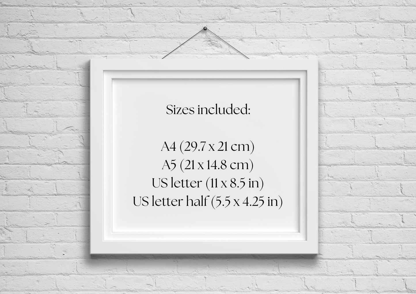 White picture frame with text explaining the sizes of pages available in the download of the minimalist habit tracker