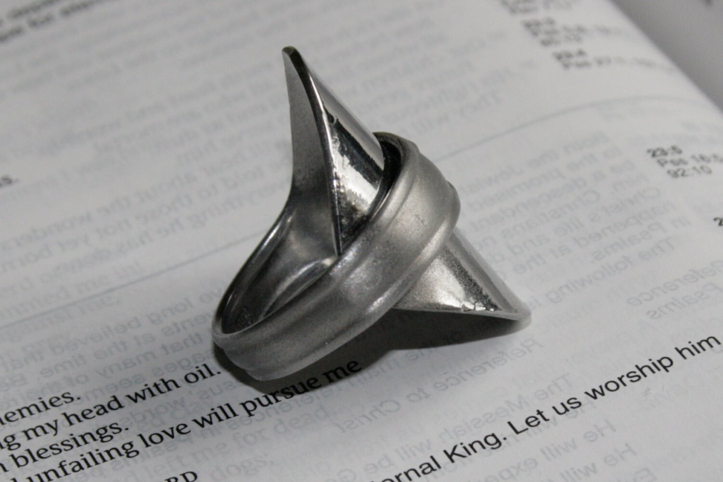 Upcycled silver ring made from antique spoon with flat gloss focal and sandblasted band, side view