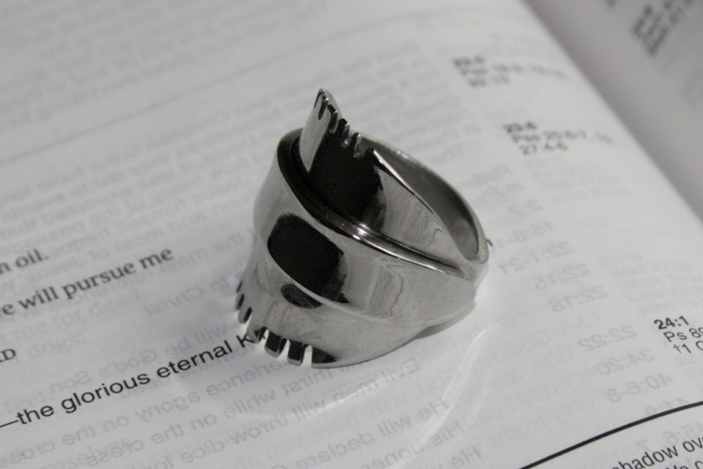 Upcycled silver ring made from antique spoon with notched edge detail, side view