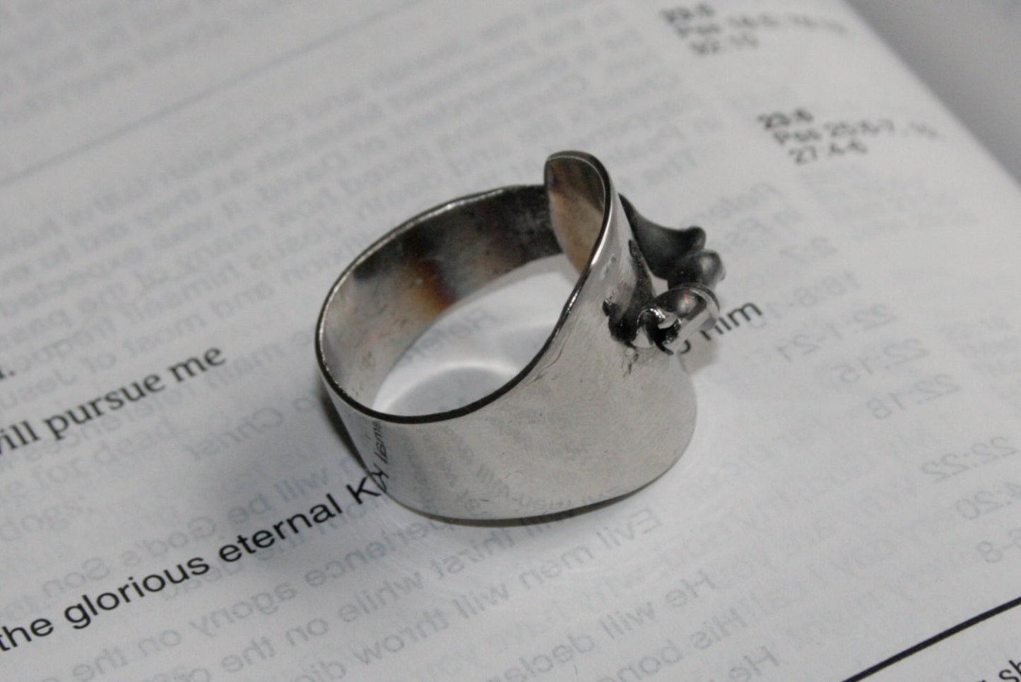 Upcycled silver ring made from antique spoon with twist detail, side view