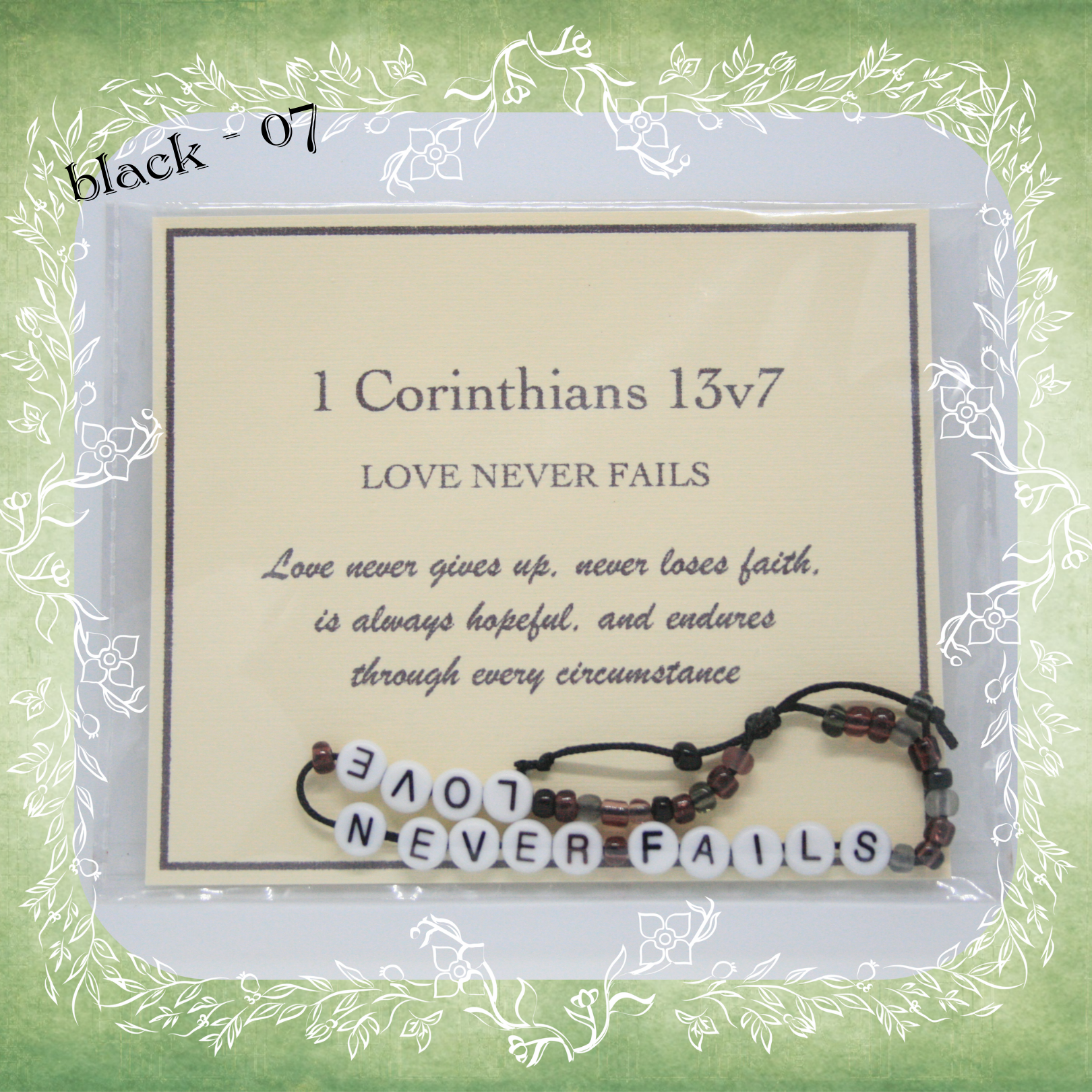 Love Never Fails Bible verse bracelet with letter beads and scripture verse card, packaged for gifting and encouragement, black cord and bead mix 07