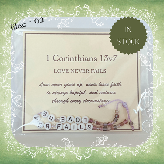Love Never Fails Bible verse bracelet with letter beads and scripture verse card, packaged for gifting and encouragement, lilac cord and bead mix 02