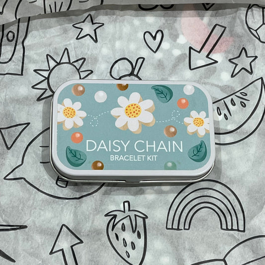 Plastic-free kids daisy chain bracelet kit with wooden daisy and leaf beads, round beads, and elastic, box closed