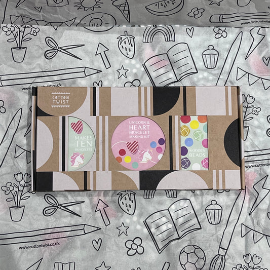 Plastic-free kids unicorn and heart bracelet kit with wooden beads, and elastic, box closed