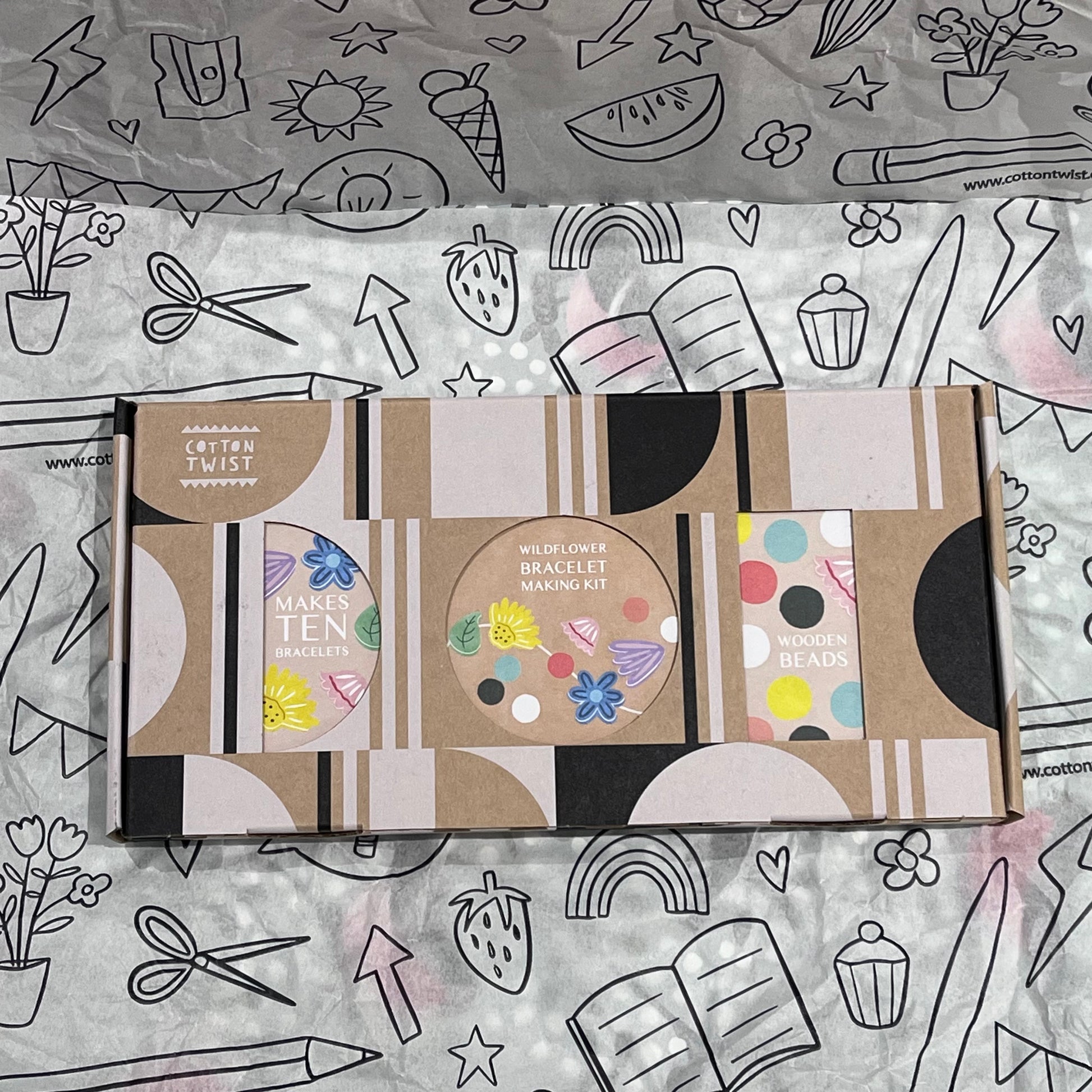 Plastic-free kids wildflower bracelet kit with wooden beads, and elastic, box closed