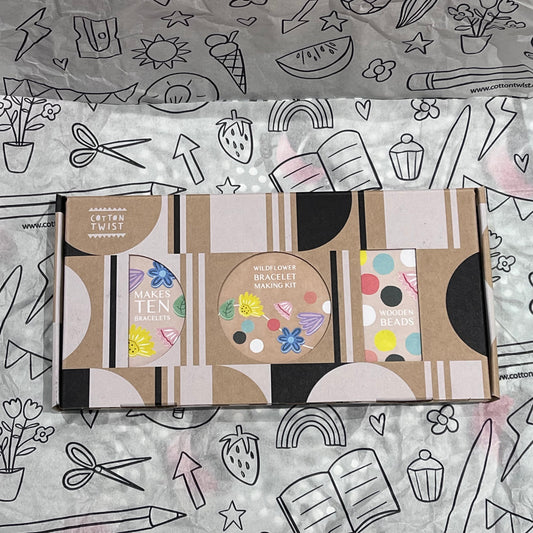 Plastic-free kids wildflower bracelet kit with wooden beads, and elastic, box closed