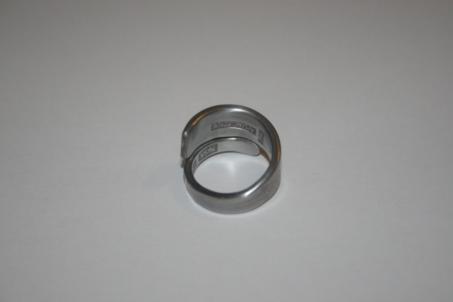 Upcycled silver ring made from antique spoon, interior showing hallmark